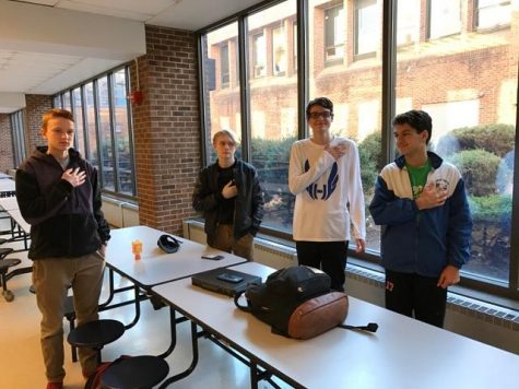 Hall students standing for the pledge because they believe it is about the soldiers mot them.