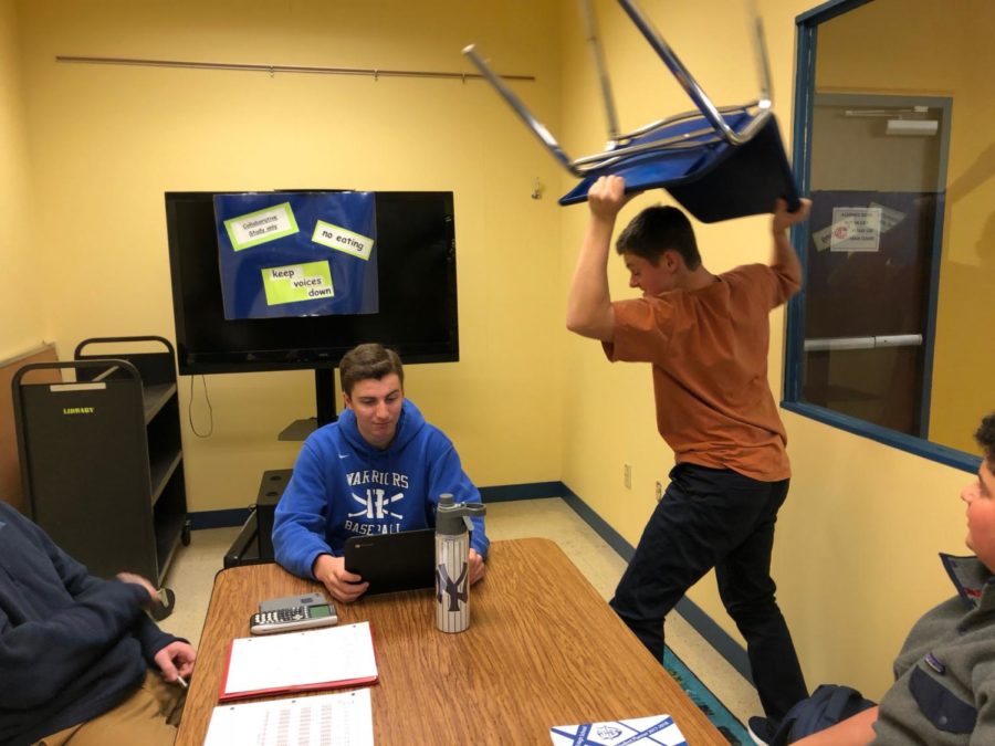 Student+throws+chair+as+a+result+of+frustration+with+library+policies.