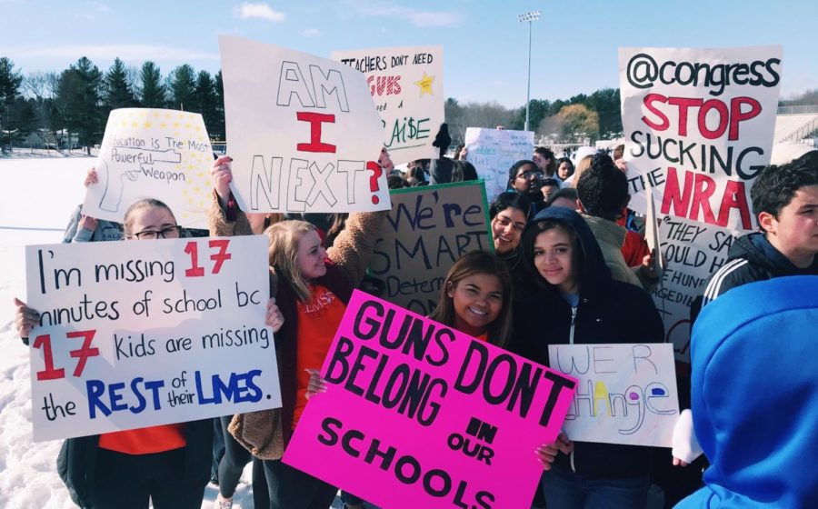 Seniors make homemade signs to protest gun control and fight for school safety