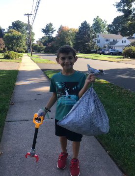 West Hartford Boy Spends Free Time Picking Up Trash on North Main Street