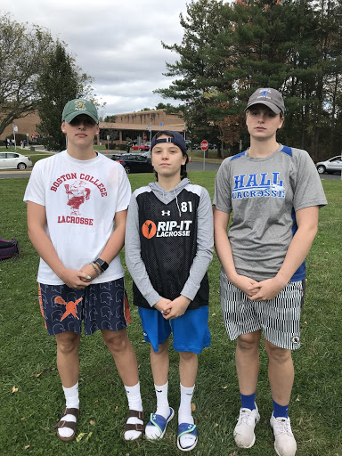 Swim team dresses as lax bros for a spirit day before a game.