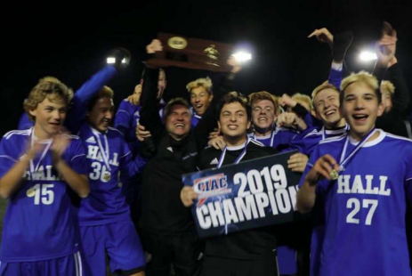 The Boys Soccer Team celebrating their victory