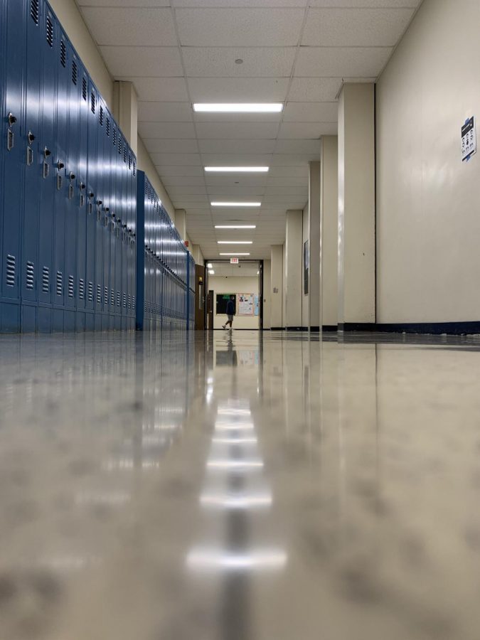 The reflection of lights in the halls leading to a student, the only one who can make a change.