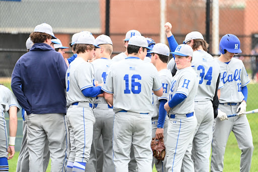 Hall’s Baseball team huddled in preparations for their game at Middletown.