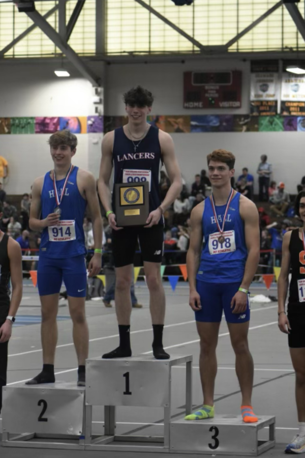 Gabriel Sisk (left) and Jonathan York (right) place 2nd and 3rd in the 600m to receive All-New England Honors. 