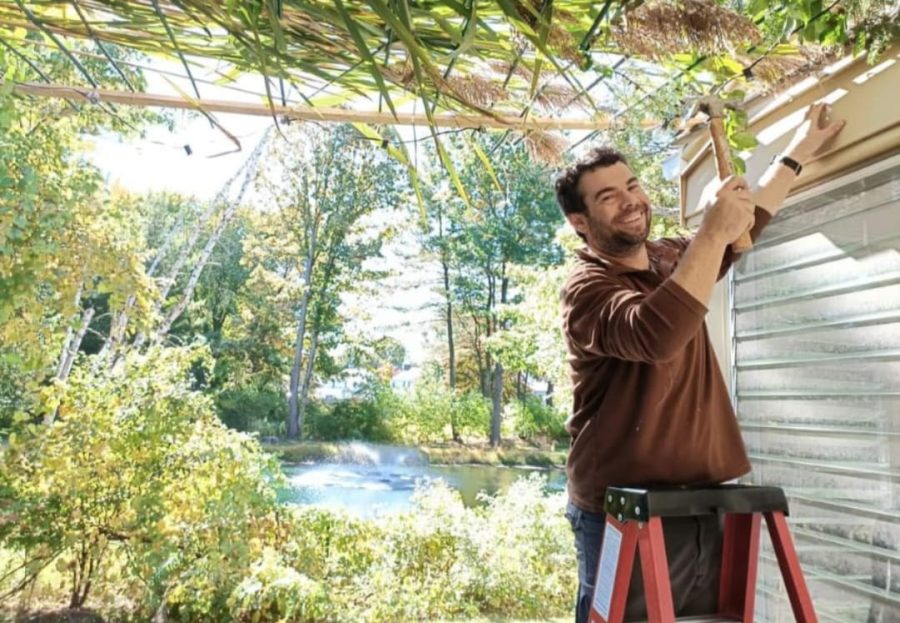Building the Sukkah that the family is building in honor of Sukkot