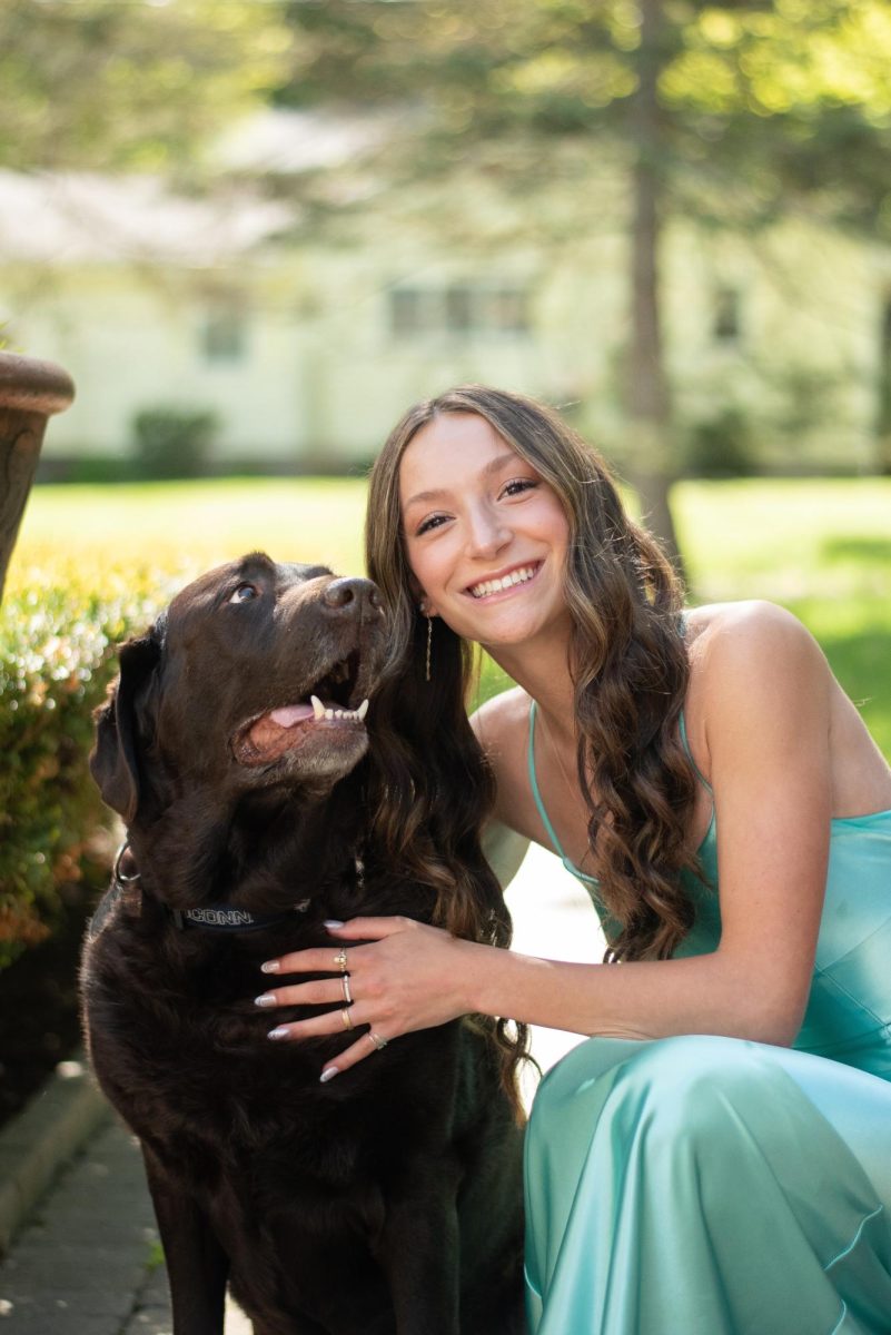 This is a photo of me and my dog from prom.