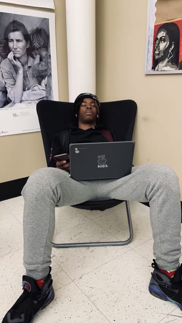After an early start to his day, Ameer Kentrell falls victim to sleep in his chair in History.