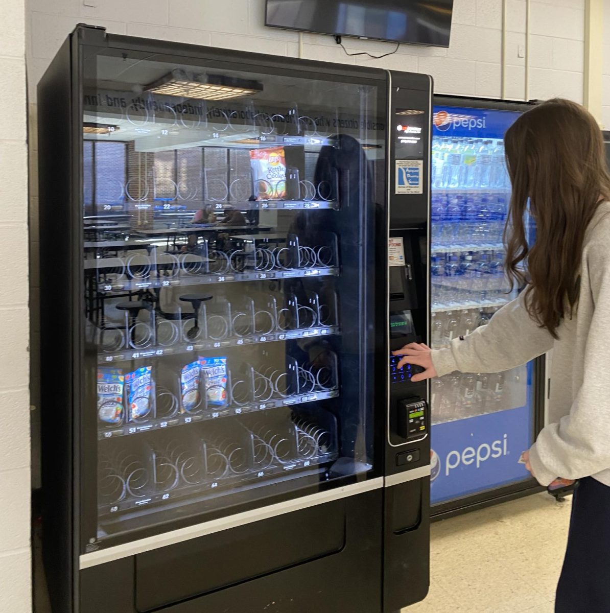  The vending machine only being available to students after 1:30 makes it so that students are forced to buy school cafeteria snacks that are not as good and have fewer selections. 