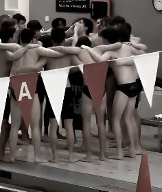 The Hall Swim & Dive team doing their traditional chant before a meet.