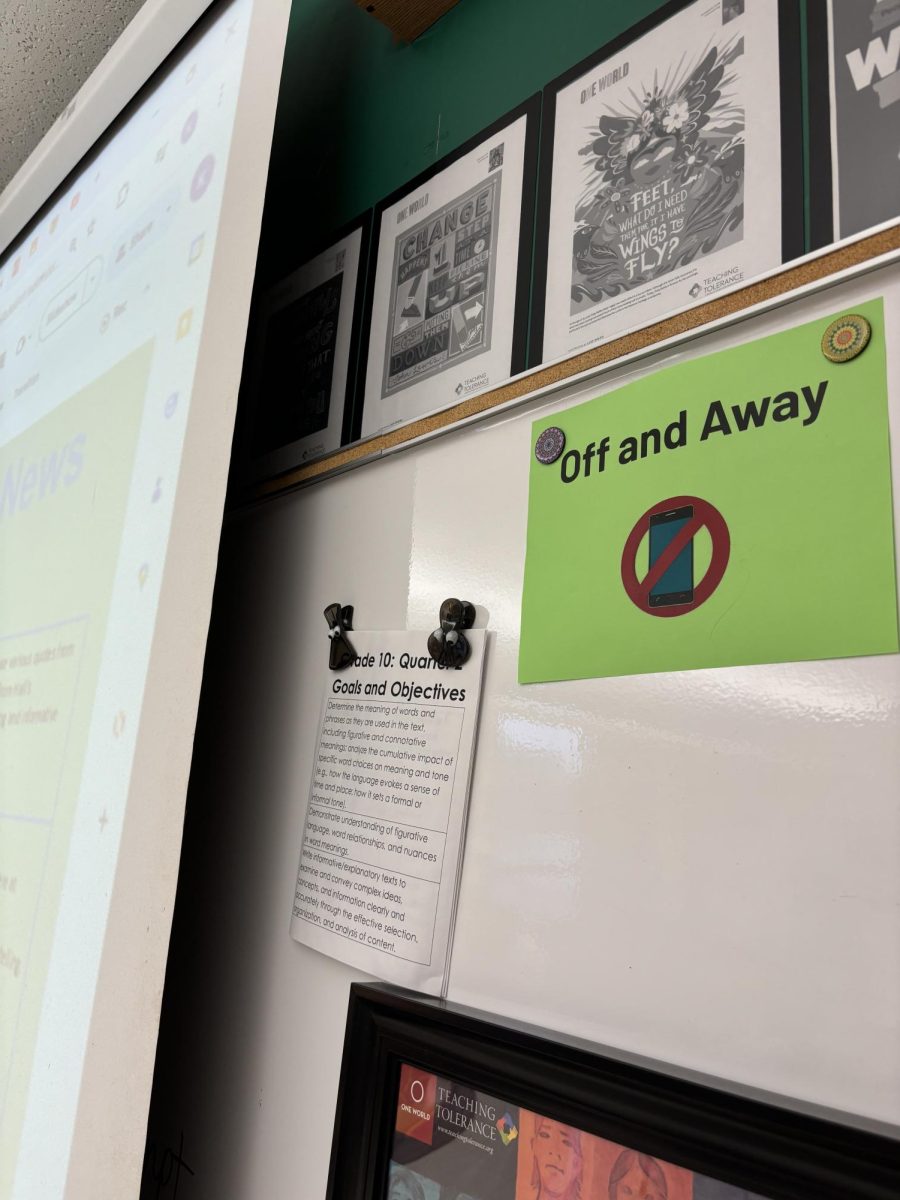 The image above shows the new off and away signs posted in every classroom