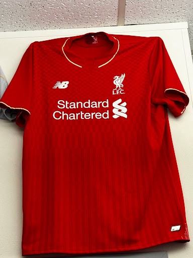This Liverpool jersey shows one reason why athletes make so much money and that's sponsorship by companies like New Balance.