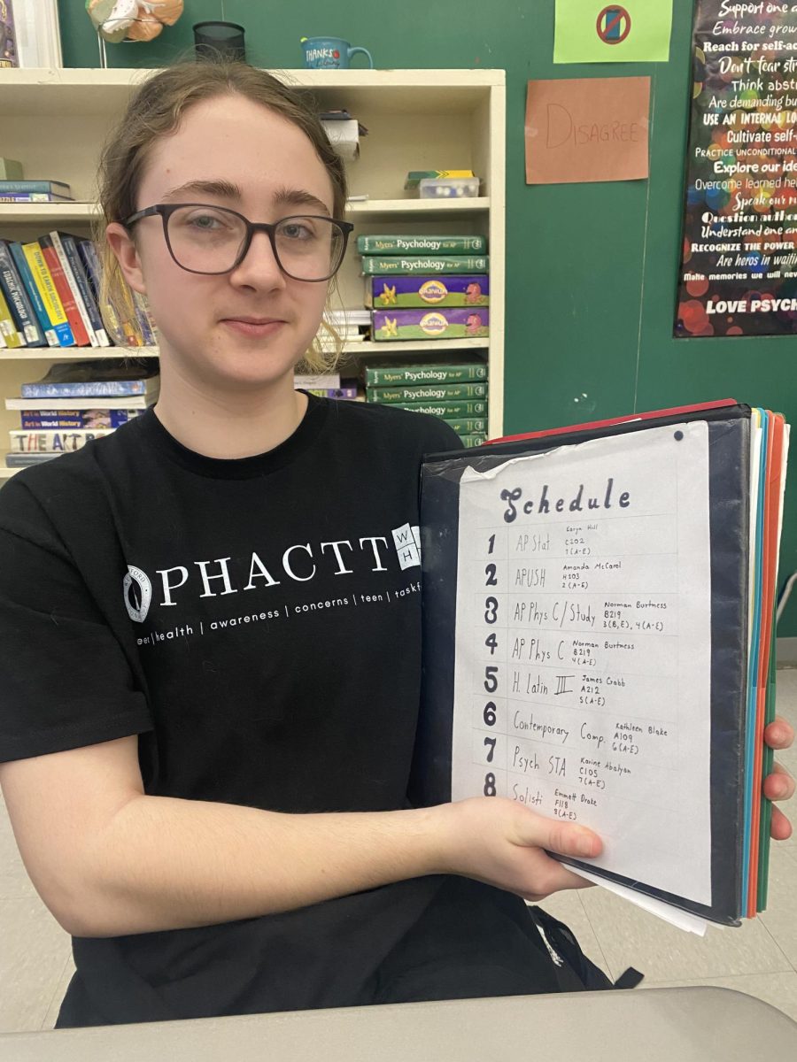 Oliver Hartmann, a senior at Hall HS, showing their AP packed schedule.
