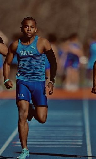 Dylan Lloyd: A Senior at Hall near the end of his first 100 meter race of his junior year outdoor track season.