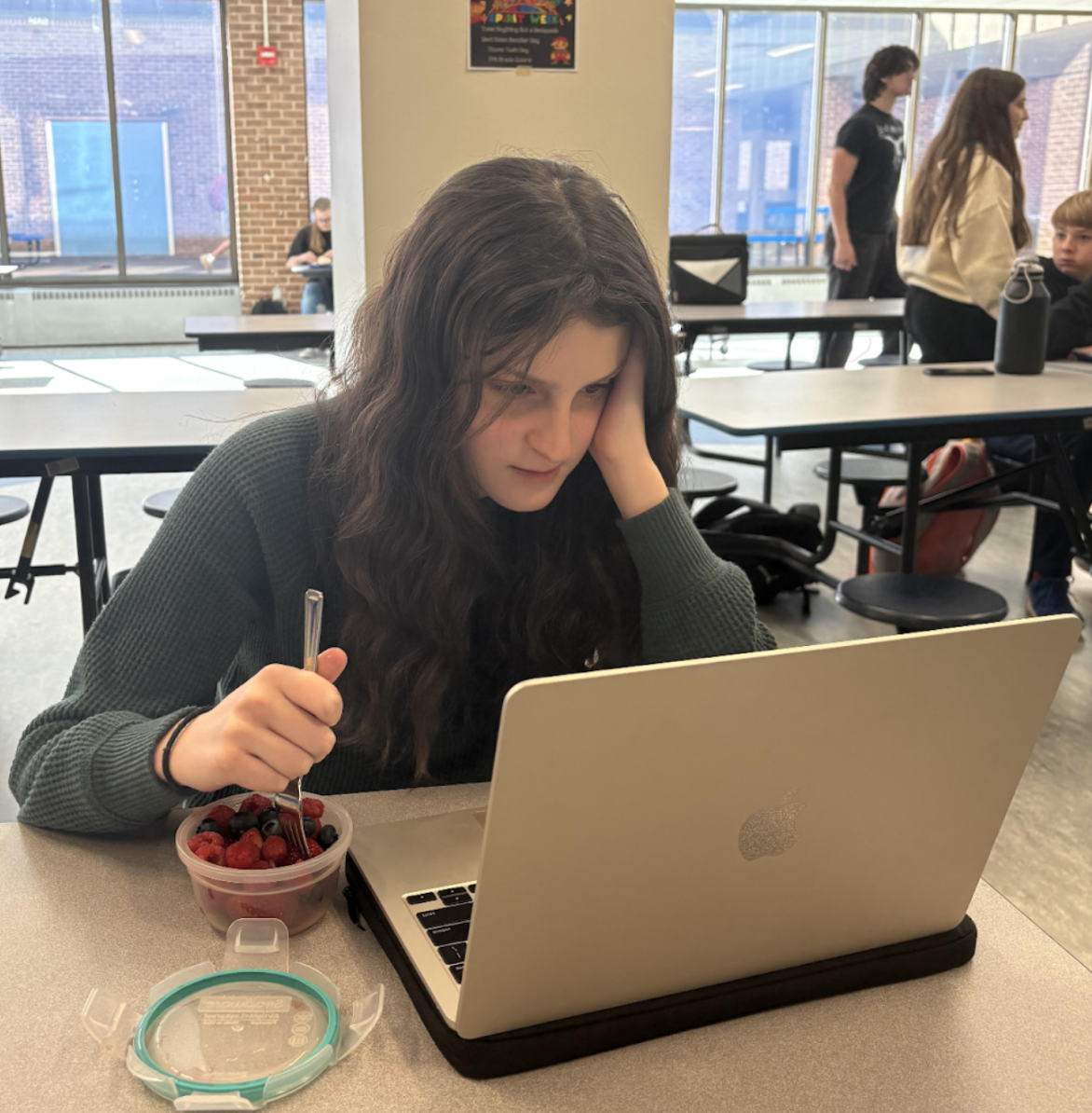 Afterwards, in the cafeteria, Hannah Fink tries to study while eating on Thursday, October 16, 2025 but cannot focus due to all of the commotion around her. 