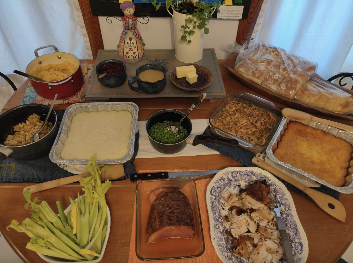 A table full of a typical thanksgiving feast.