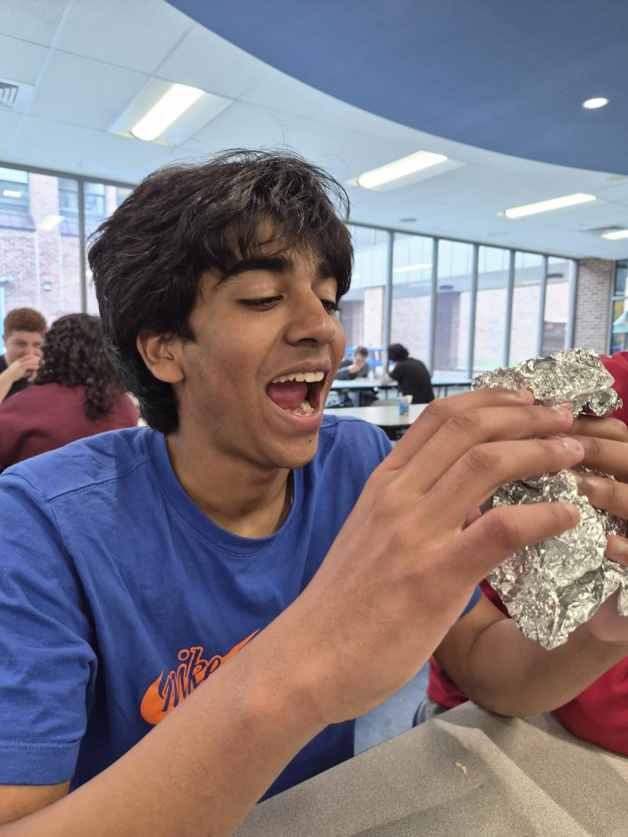 A Hall student enjoying a meal in the lunch room