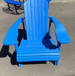 An Adirondack chair awaits a sitter on a lukewarm April day.