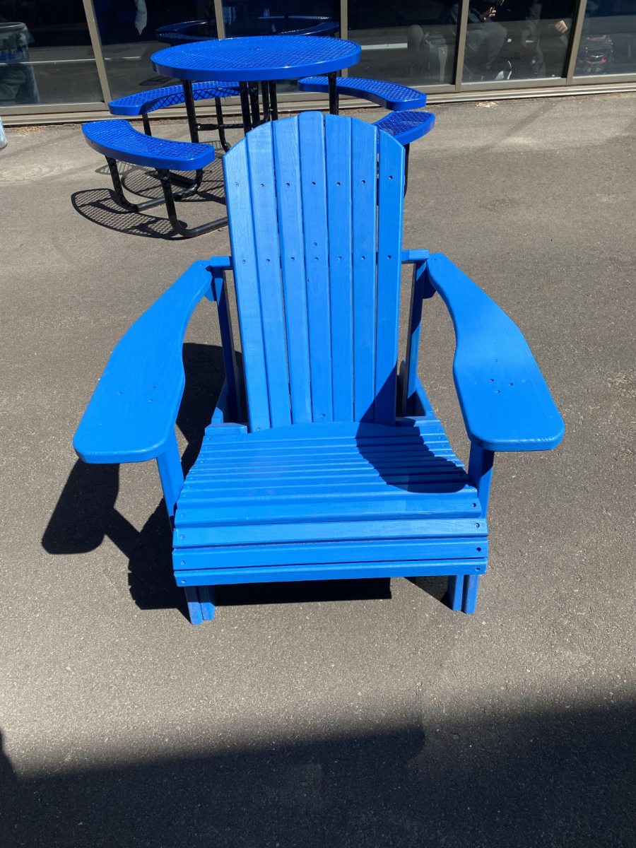 An Adirondack chair awaits a sitter on a lukewarm April day.
