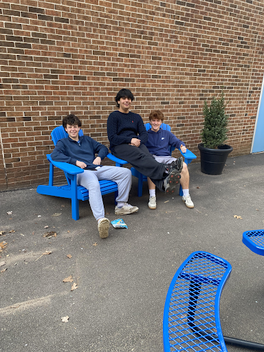 Students relax on a warm April 1st in the courtyard